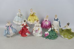 A collection of nine Royal Doulton lady figures, largest approximately 21 cm (h).
