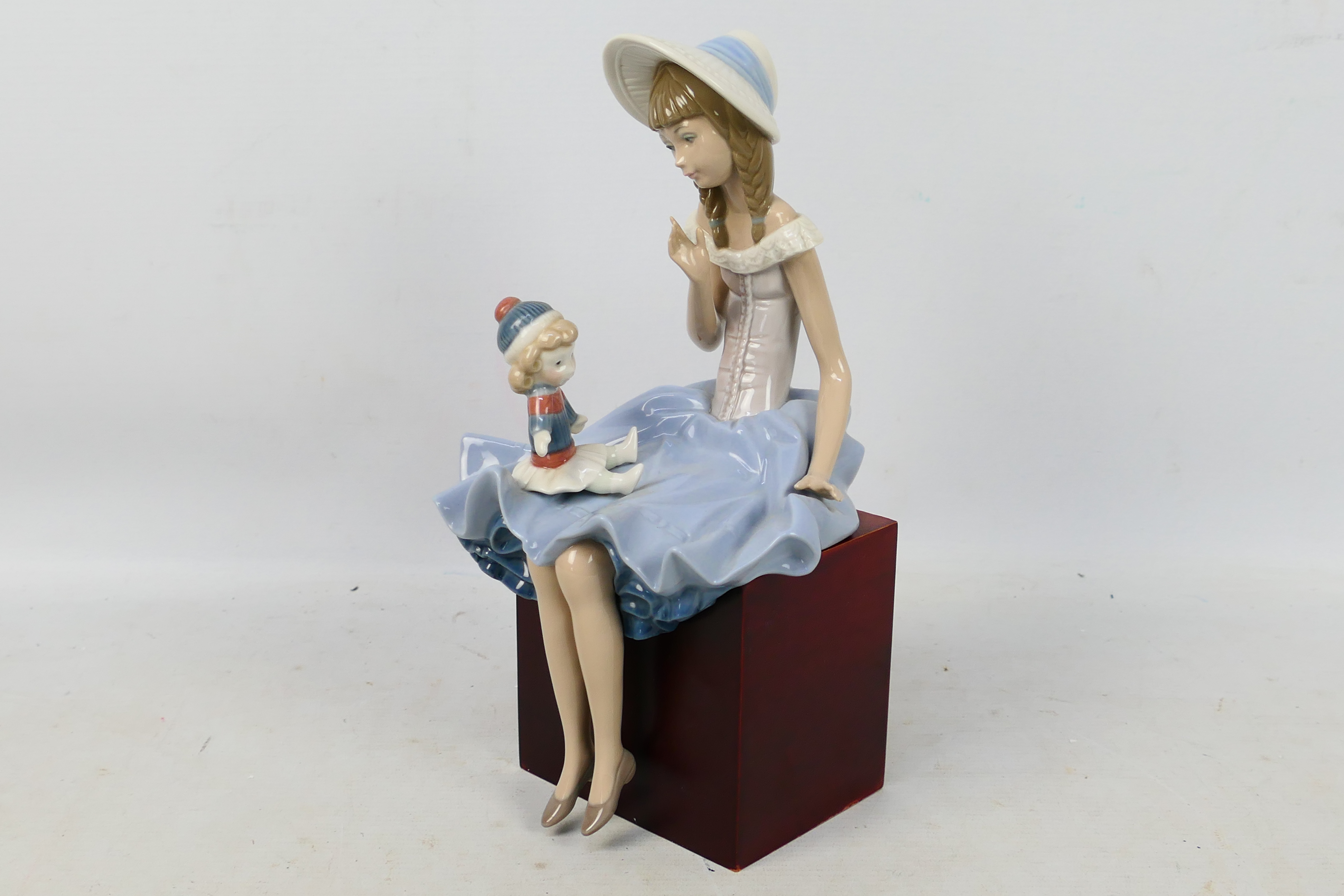 Lladro - A figural group entitled Suzy And Her Doll # 1378, approximately 28 cm (h). - Image 2 of 5