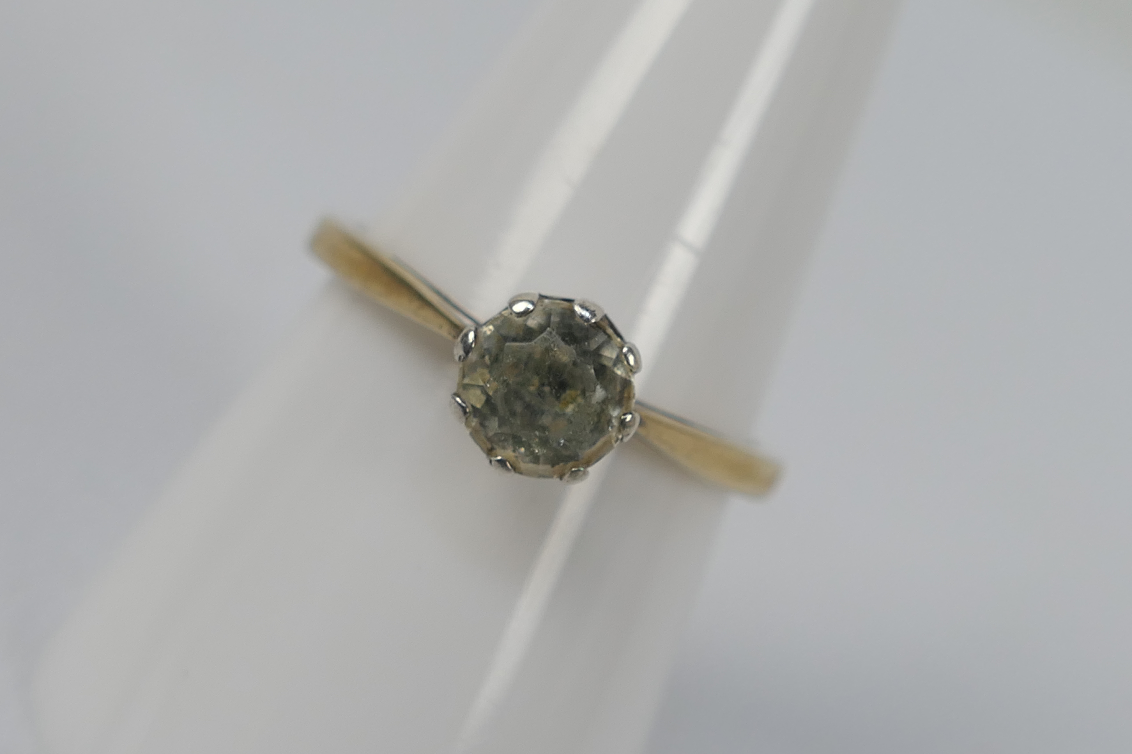A yellow metal single stone ring, stamped 9ct CZ, size P, approximately 2. - Image 2 of 5