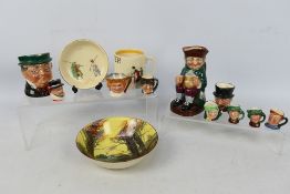 A collection of Royal Doulton ceramics to include character jugs, Toby jug, bowl and other.