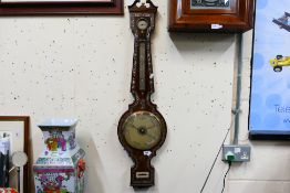 19th century wheel barometer with mother of pearl inlay, dry / damp indicator, 8" main dial,