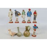 Six Krishnanagar clay figures, largest approximately 11 cm (h), bird figure and other.