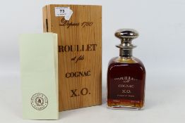 A 750 ml bottle of Roullet et fils X.