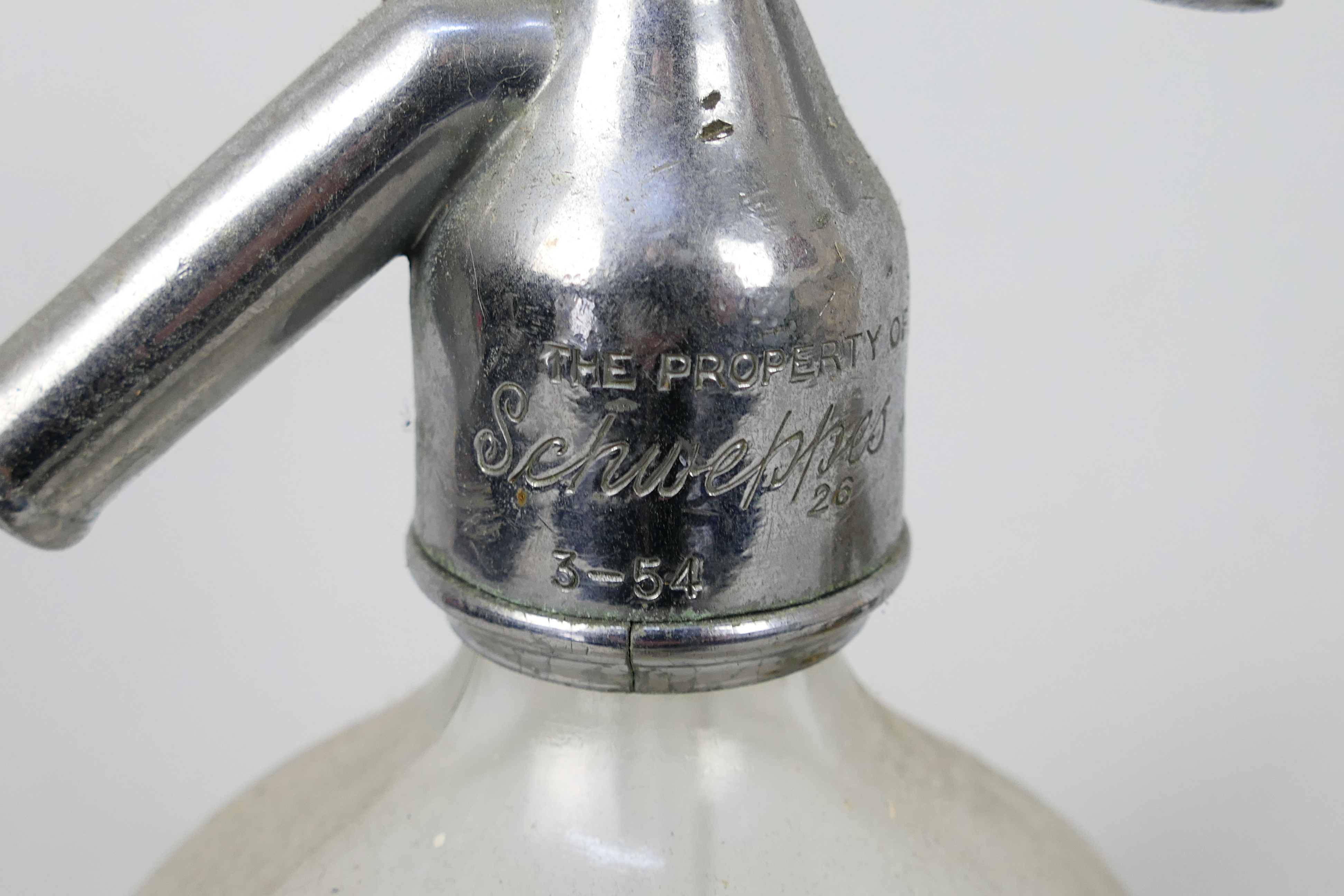 A brass propeller, brass weights and a vintage Schweppes soda syphon. - Image 8 of 8