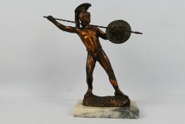 A cast metal figure depicting a Greek warrior with shield and spear, approximately 34 cm (h).