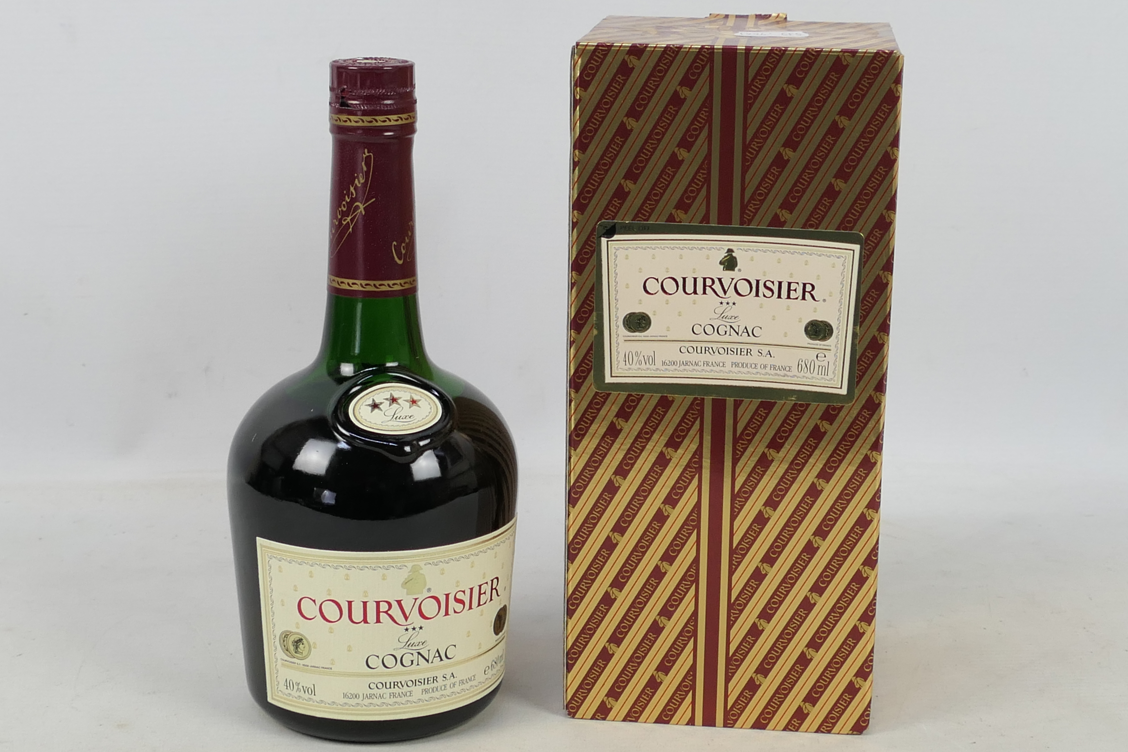 Cognac - Courvoisier *** Luxe, 680ml, 40% vol, level upper shoulder, contained in carton.