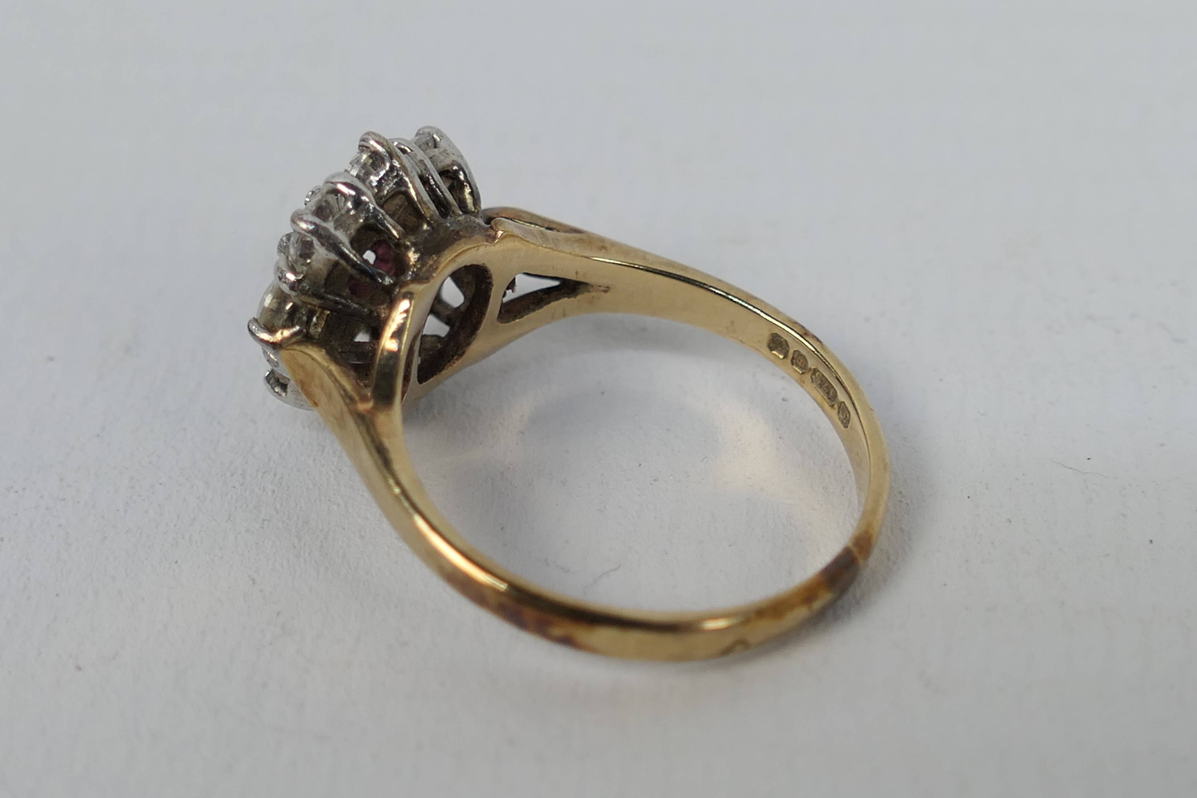 A 9ct yellow gold ruby and cz cluster ring, size M, approximately 3.4 grams all in. - Image 2 of 4