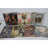 A collection of 12" vinyl to include David Bowie Hunky Dory, Pink Floyd Ummagumma,