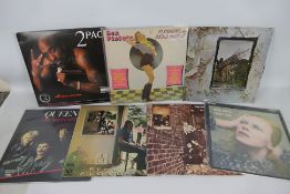 A collection of 12" vinyl to include David Bowie Hunky Dory, Pink Floyd Ummagumma,