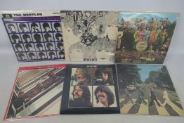 The Beatles - Six 12" vinyl records comprising A Hard Day's Night PCS3058, Revolver PMC7009,