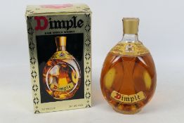 Haig Dimple, 26⅔ fl oz, 70° proof, wire wrapped bottle, level upper shoulder,