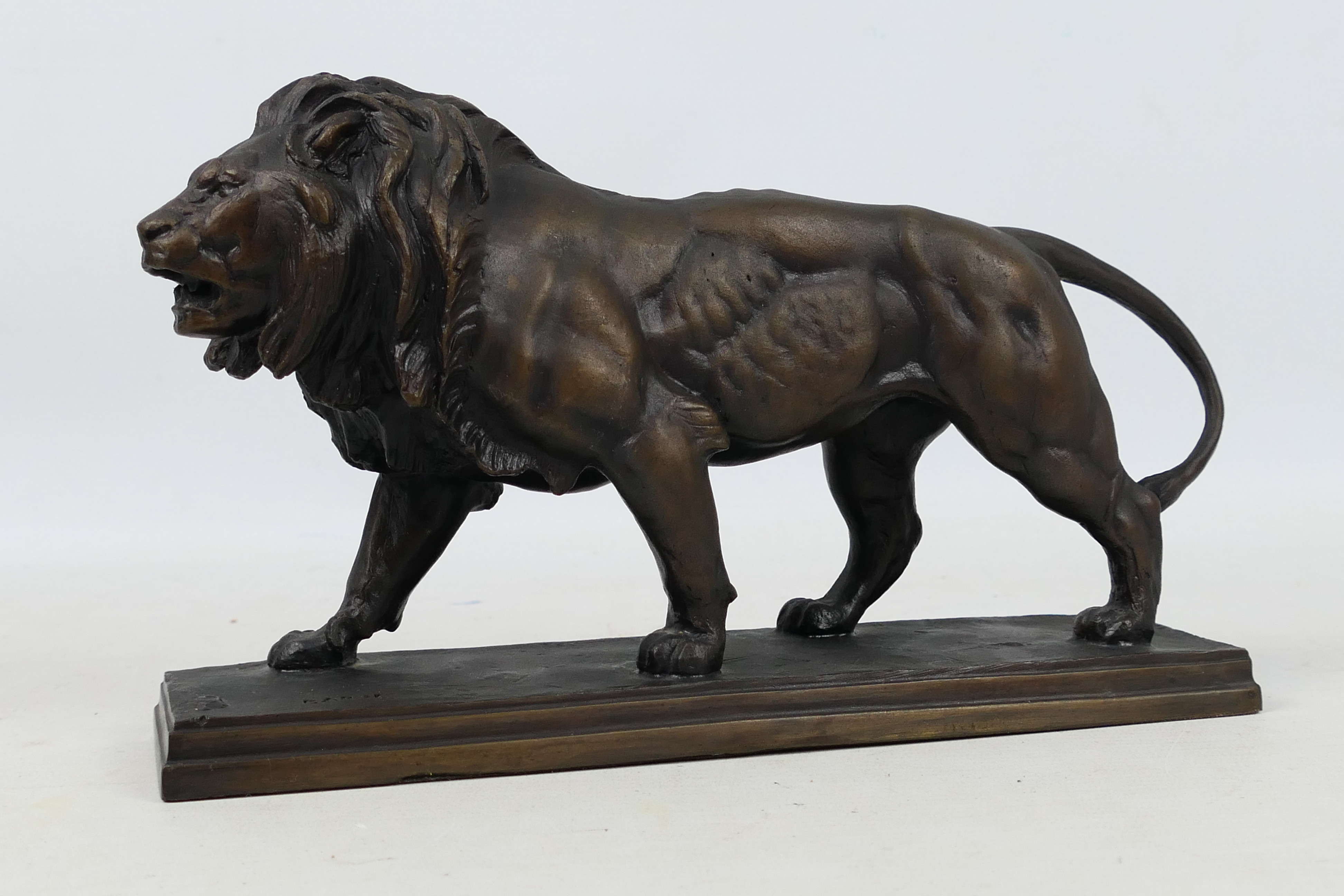 Franklin Mint - A 'Lion Qui Marche' bronze lion statue by Antoine-Louis Barye -. - Image 2 of 7