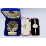 A lady's vintage 9 carat gold cased watch stamped 9; 375,