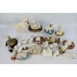 A collection of figures / groups depicting West Highland Terriers, various sizes.