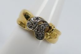 An 18ct yellow gold and diamond ring, size M, approximately 4.8 grams.