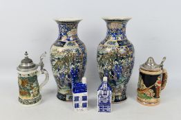 Lot to include a pair of Chinese vases, 30 cm (h), covered steins and Delft wares.