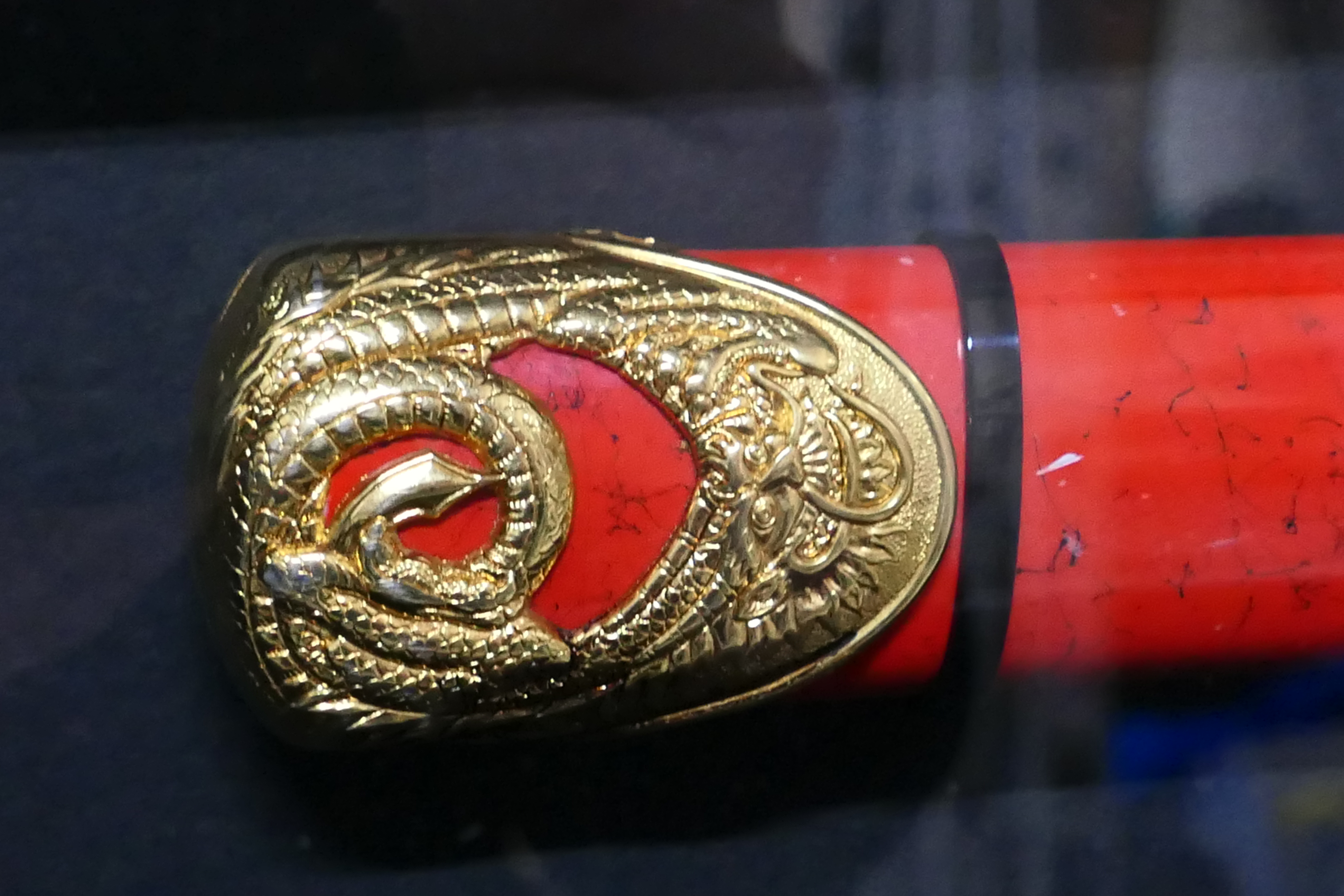 A decorative Japanese sword display comprising katana with dragon form hilt and red lacquered saya, - Image 2 of 9