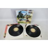 Oasis - Be Here Now, CRELP 219, Mike's The Exchange on all four sides.