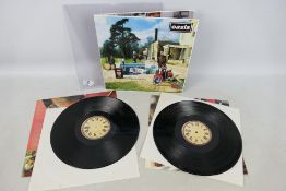 Oasis - Be Here Now, CRELP 219, Mike's The Exchange on all four sides.