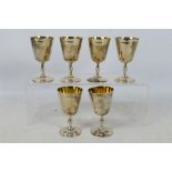 Six silver goblets, each with gilt interior, Birmingham assay, approximately 475 grams / 14 ozt.