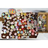 A collection of vintage pin badges to include motoring related / Ford / Mini Cooper / and other.