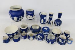 A collection of Adams blue and white Jasperwares to include vases, bowls and similar,