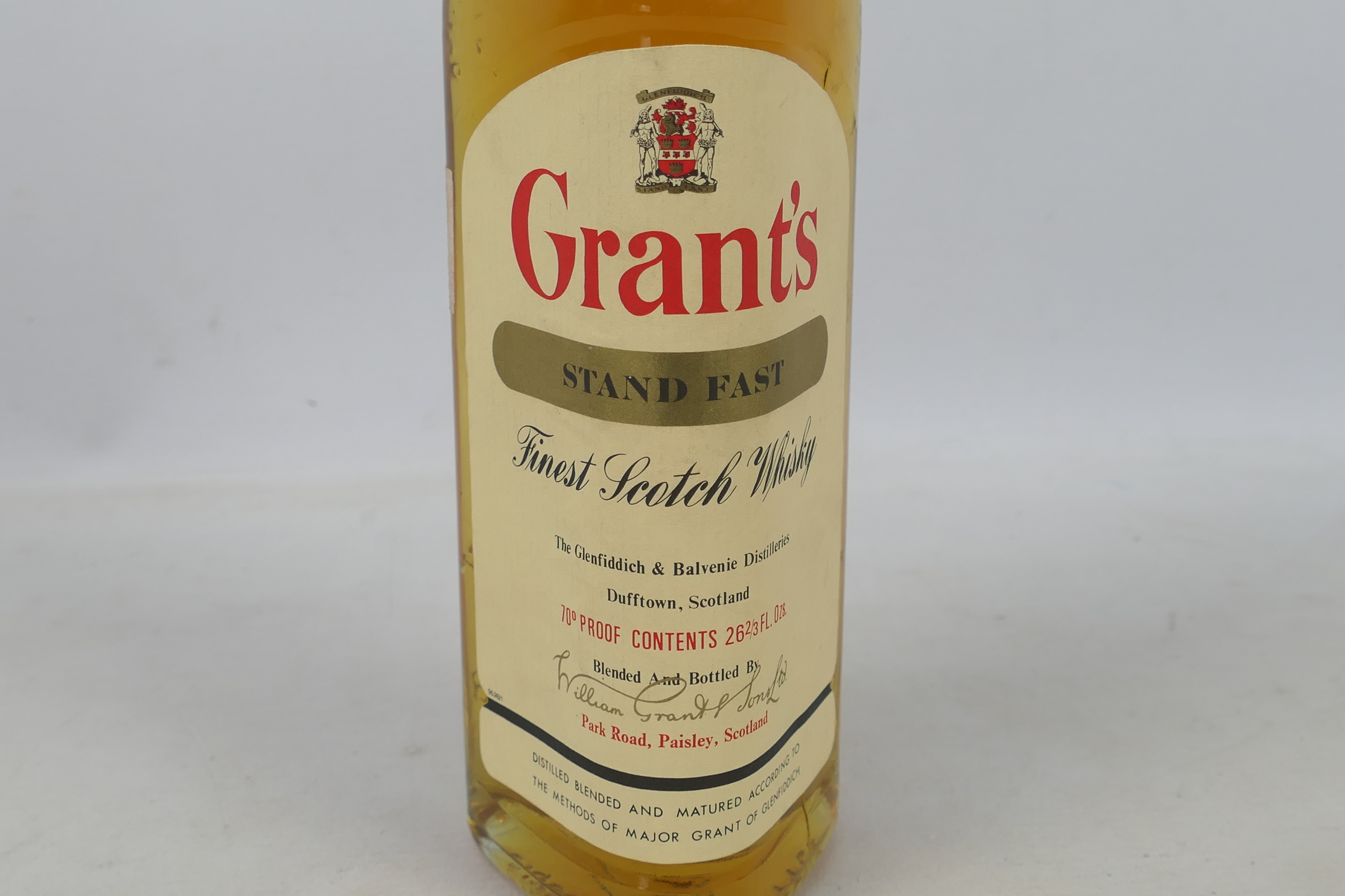 A 26⅔ fl oz bottle of Grants Stand Fast, 70° proof, level lower shoulder, likely a 1970's bottling. - Image 3 of 4