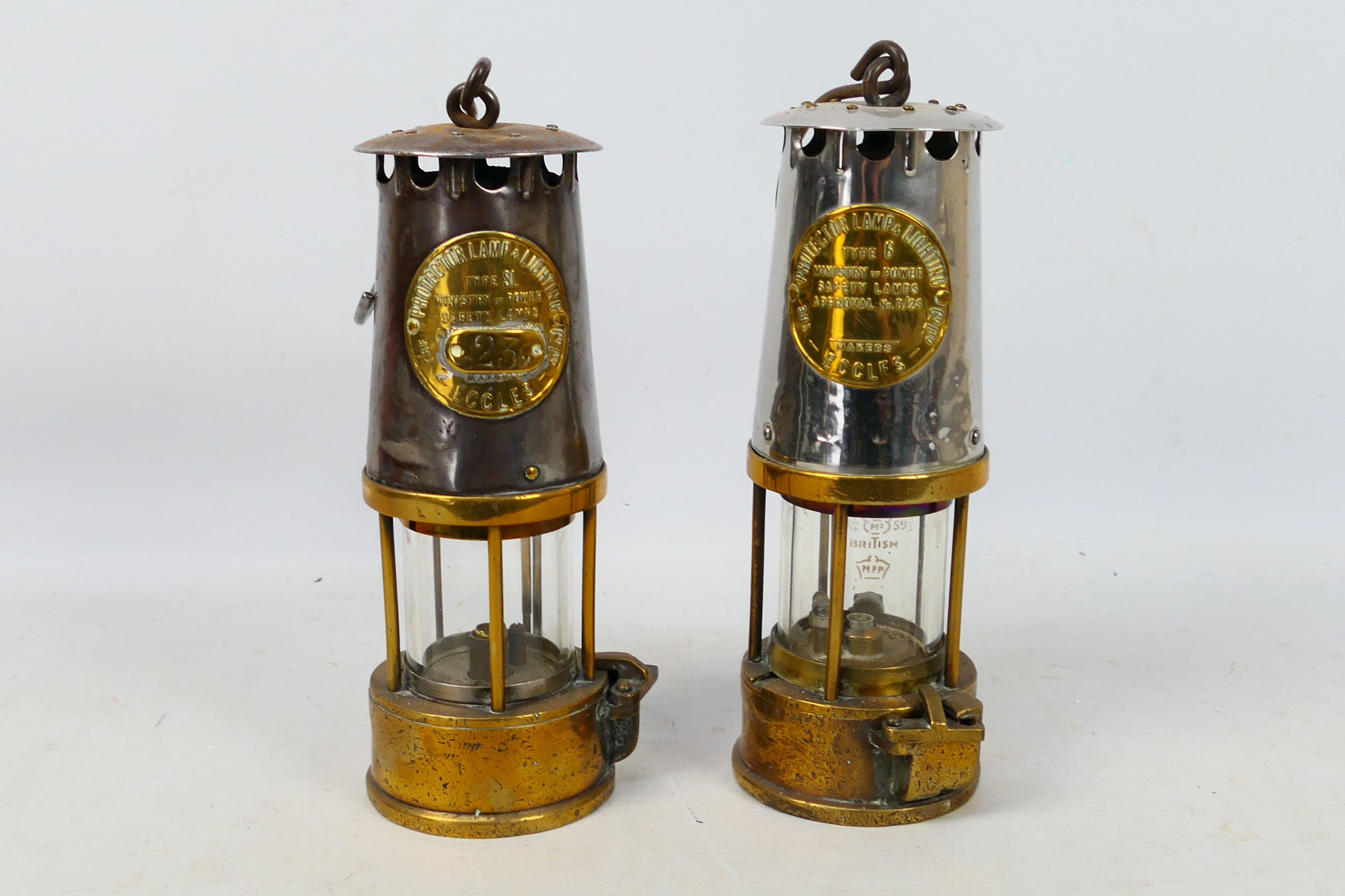 Two Eccles Protector Lamp & Lighting Company Ltd safety lamps comprising a type SL and a type 6,