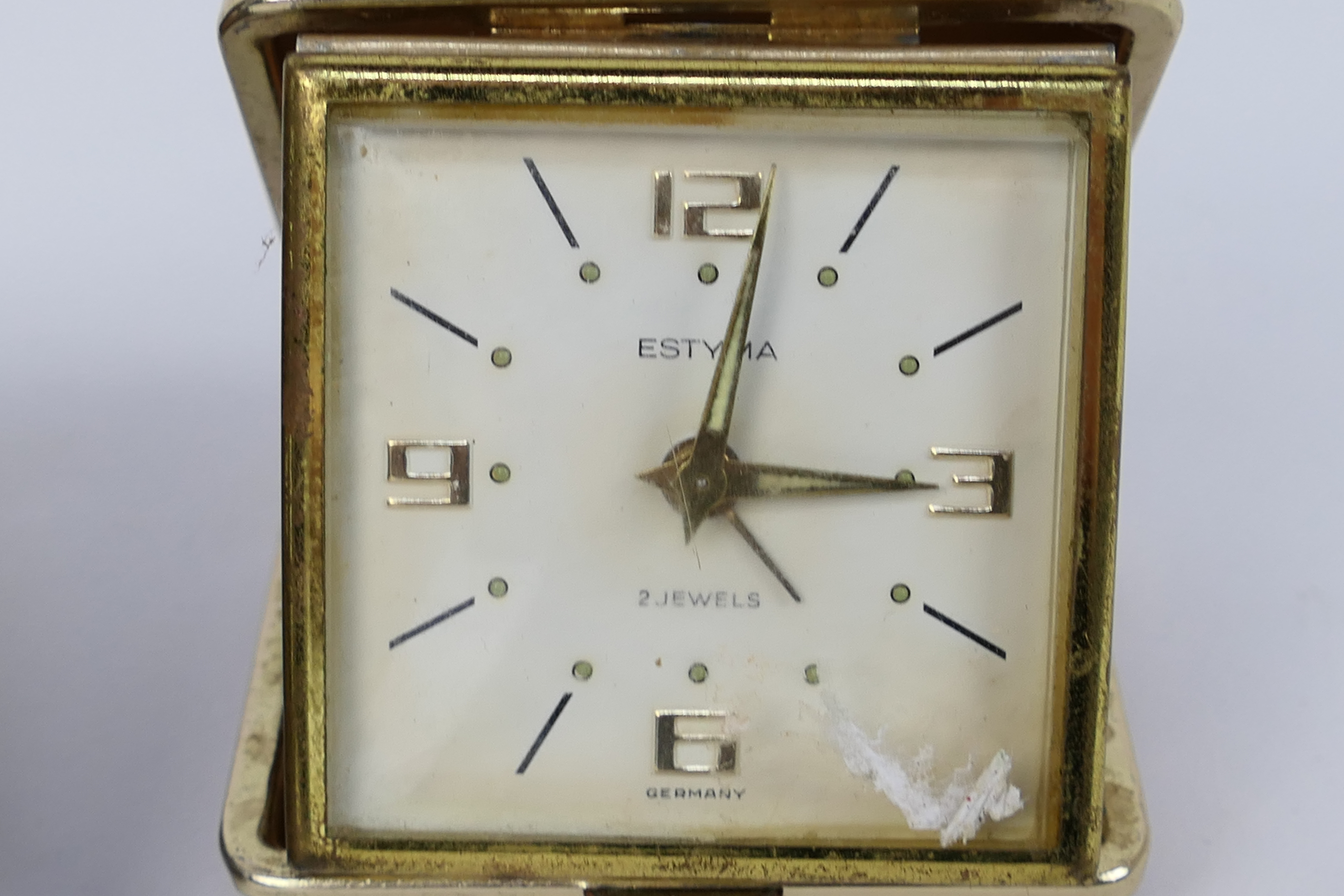 A Smiths Art Deco travel alarm clock in folding leather case, one further travel alarm clock. - Image 3 of 4