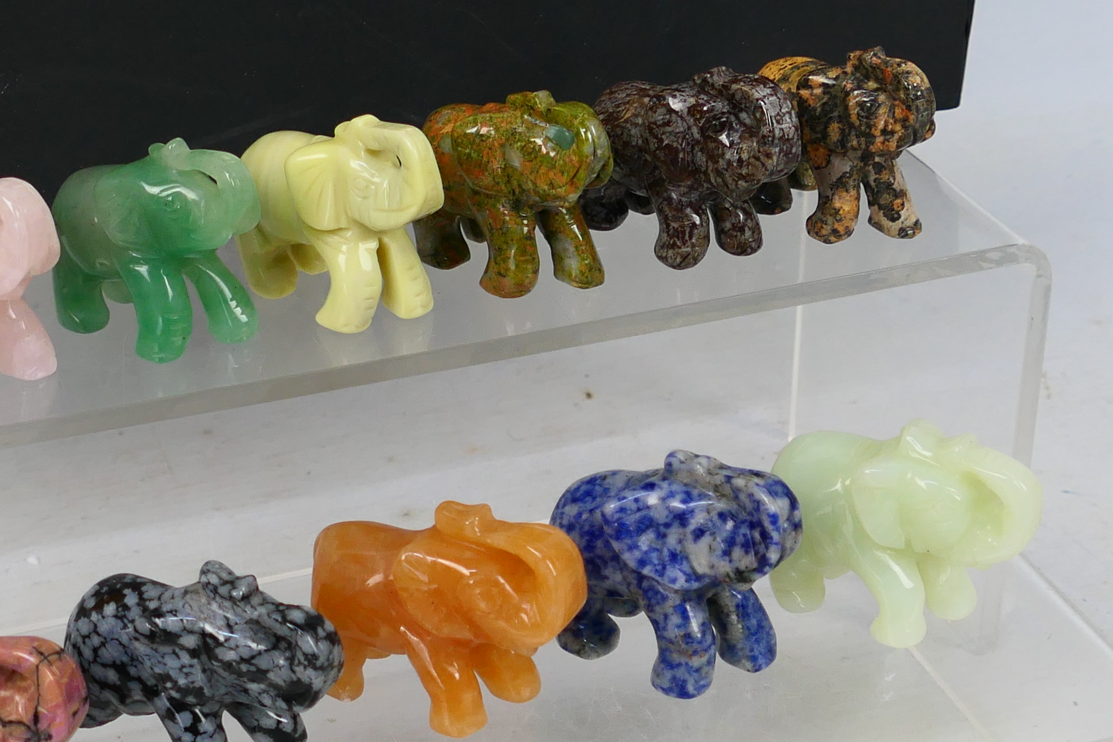 A collection of twelve carved elephants, each carved from a different hardstone, - Image 4 of 7