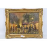 A gilt framed oil on canvas depicting a continental street scene, indistinctly signed lower right,