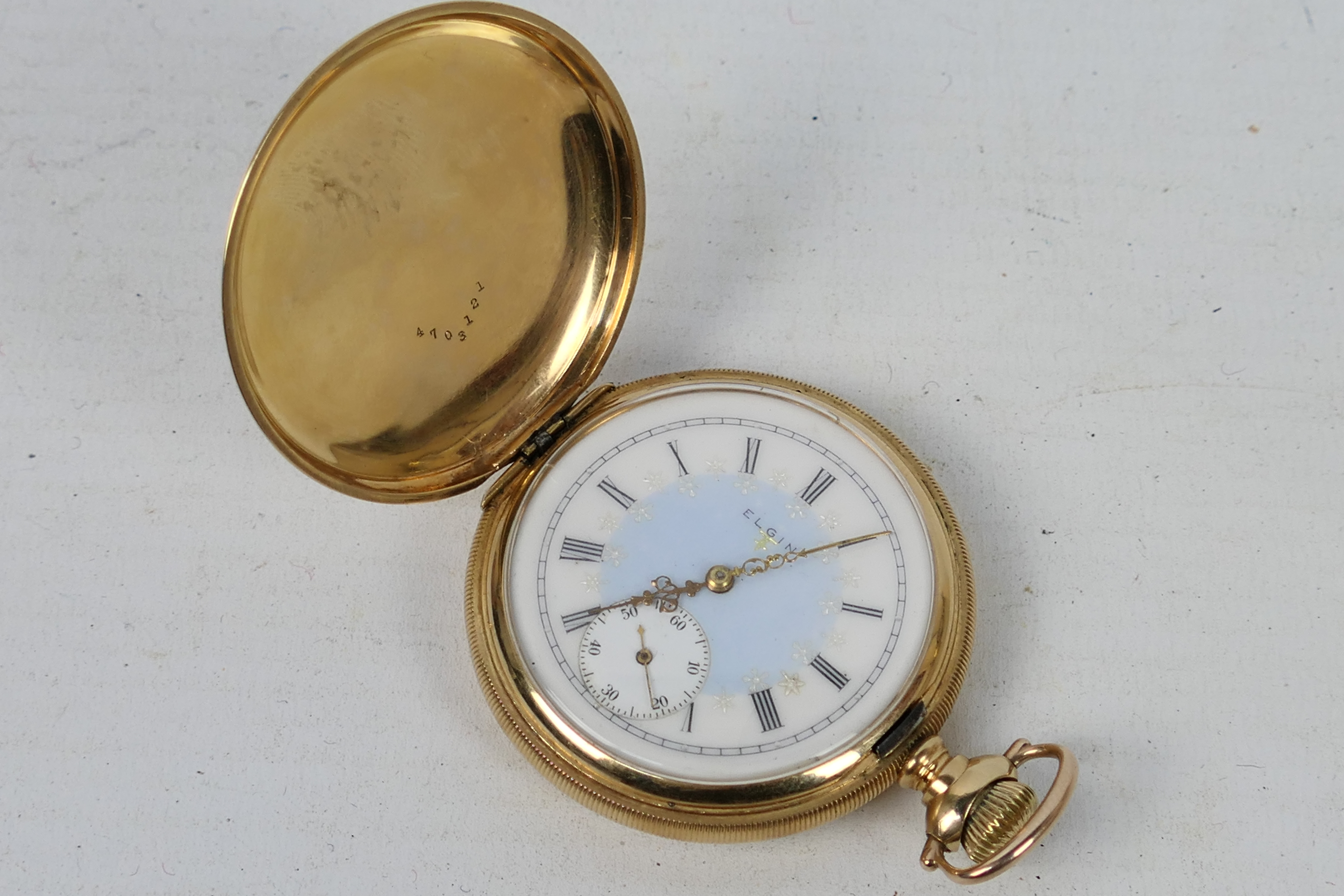 A mid-purity yellow metal cased pocket watch, the case stamped 14K, the dust cover stamped .