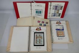 Philately - Five albums of Royal commemorative stamps to include Coronation and Royal wedding