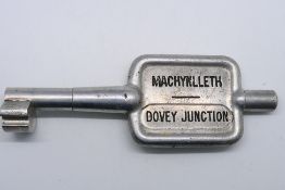 Single Line alloy Key Token, Machynlleth - Dovey Junction, slight traces of yellow paint remaining.