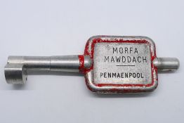 Single Line alloy Key Token, Morfa Mawddach - Penmaenpool, traces of red paint remaining.