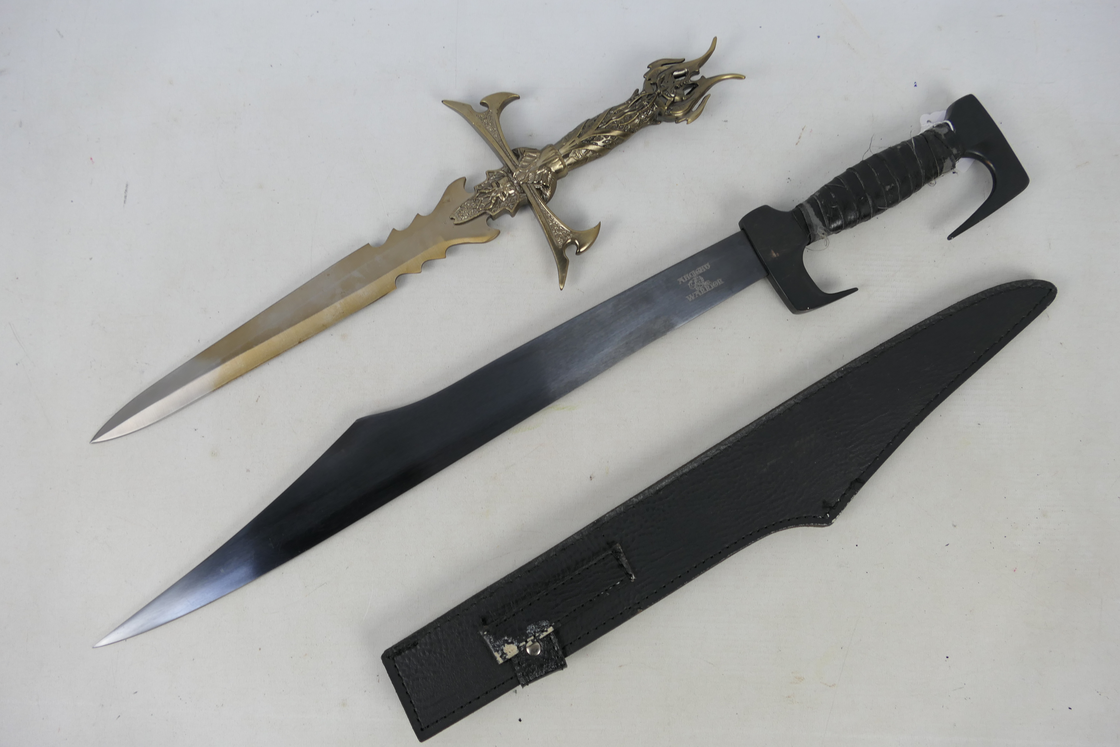 An Ancient Warrior short sword and a fantasy type dagger, largest approximately 63 cm (l).