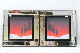 A pair of decorative wall art pictures with mirrored frames, approximately 62 cm x 61 cm.