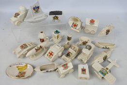 Crested Ware including military related pieces comprising airship, armoured car, tanks,