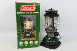 Coleman - Lantern. A Coleman 'Northstar' Dual-Fuel lantern in Green and original box.