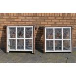 Two Arts and Crafts, leaded and stained glass window panes, approximately 75 cm x 80 cm,