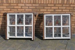 Two Arts and Crafts, leaded and stained glass window panes, approximately 75 cm x 80 cm,