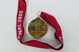 Liverpool Football Club Interest - A reproduction UEFA Champions League Winners medal for 2005,