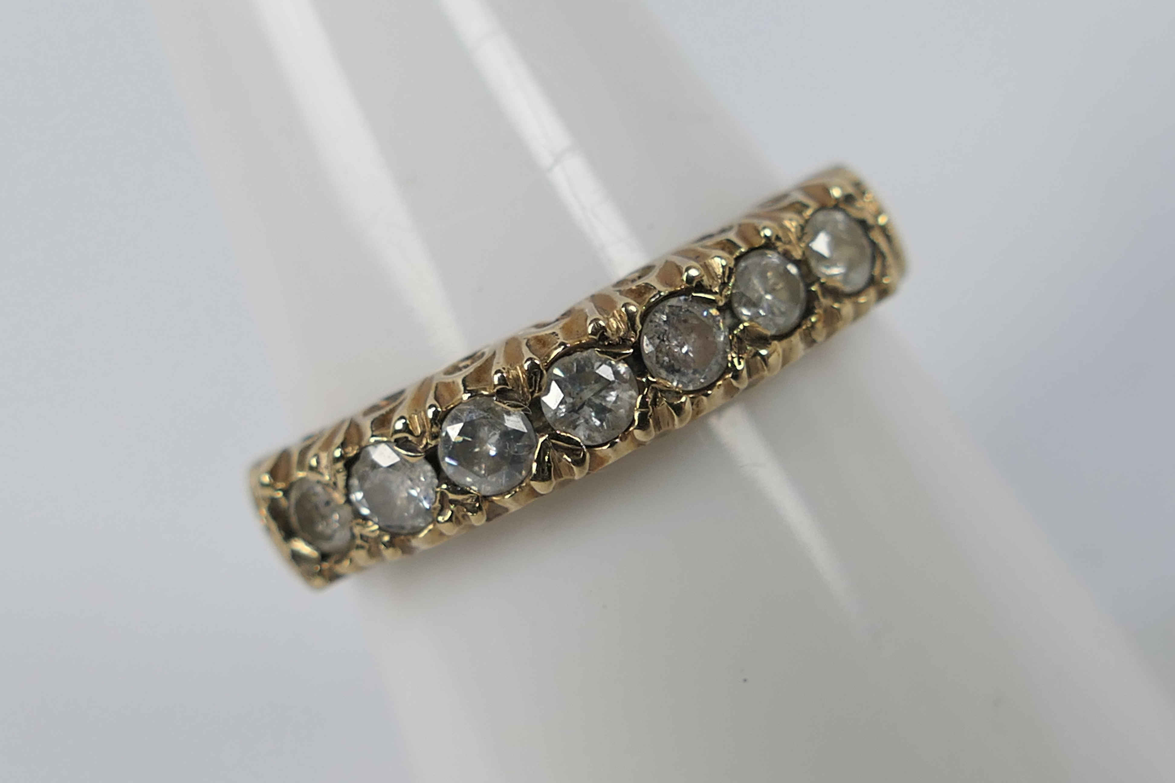 A 9ct gold stone set ring, size O+½, approximately 2.3 grams all in.