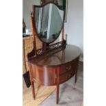 Robert Garnett & Sons Warrington - A high quality oak bow fronted dressing table with shield mirror