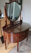 Robert Garnett & Sons Warrington - A high quality oak bow fronted dressing table with shield mirror