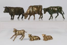 6 x bronze bulls and cow figures. All in various sizes. Largest is 7 1/2 cm (l).