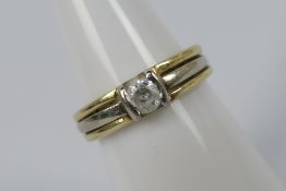 A mid-purity two-tone, solitaire ring, stamped Altinbas 585 for 14ct, size K, approximately 3.