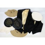 Naval cap with HMS Daedalus tally, waistcoats, RAF beret and other.