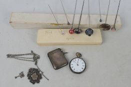 Lot to include a silver vesta case, silver cased pocket watch, silver sporting medal,