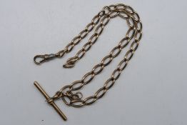 A 9ct rose gold watch chain and T-bar, 36 cm (l), clasp A/F and repaired with base metal,